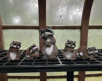 332 artlinesetofplasticraccoonfigurines