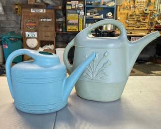 394 pairofdecorativeplasticwateringcans