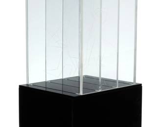 2344 A Contemporary figural acrylic light box Late 20th century Unmarked The illuminated box with four stacked acrylic partitions, each etched with a dancing figure, electrified Overall: 16" H x 8" W x 9.75" D Estimate: $200 - $400