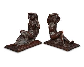 2249 Isidore Konti (1862-1938) A near-pair of patinated bronze figural bookends, 1914 Each signed and dated in the casting: © I. Konti. 2 pieces Taller: 7.5" H x 7.75" W x 4.75" D Estimate: $300 - $500