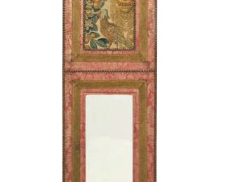 2075 An Aubusson tapestry fragment wall mirror Late 19th century or later The double-panel wall mirror with a mirror to lower panel, and a framed tapestry fragment to the top, depicting a bird among fruit swags and a grotto-style grotesque mask to one corner, the entire wood frame covered in red damask fabric, each panel embellished with gilt metal thread passementerie braid and outlined with decorative upholstery nails, with red fabric lining verso 56.25" H x 19.625" W x 1" D; Tapestry panel: 14.25" H x 10.5" W (sight) Estimate: $500 - $700