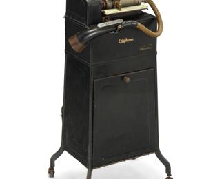 2213 An Edison 'Ediphone' dictation machine 1920s Marked to metal plaque: no. 52361; serial number D296091 Raised on casters, electrified 34" H x 18" W x 13" D Estimate: $200 - $300