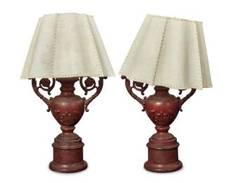 2410 A pair of cast iron urns as table lamps 20th century Each painted iron urn with foliate handles, issuing two lights and surmounted by a hide shade, electrified 2 pieces Each shade: 12" H x 16" W x 16" D Estimate: $300 - $500