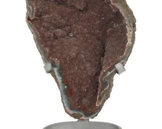 2149 A druzy agate geode specimen 20th century; Uruguay On a custom enameled metal display stand Specimen: 14.75" H x 11" W x 6" D; Stand: 11.5" H x 8.375" W x 7.25" D Estimate: $400 - $600