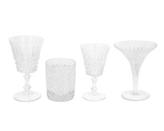 2042 A group of glass stemware and tumblers 20th century Martini glasses marked illegibly to underside; others unmarked Comprising: 12 martini glasses (5.5" H x 4.5" Dia.) 9 cordial glasses (5.25" H x 3" Dia.) 10 claret wine glasses (6.125" H x 3.5" Dia.) 6 tumblers/double old-fashioned glasses (3.75" H x 3.125" Dia.) 37 pieces Estimate: $100 - $200