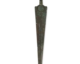 2021 A Luristan bronze short sword Circa 1200-800 BCE; Western Iran With a central raised rib running the length of the blade and a crescent pommel 18.375" H x 2.5" W x 1.25" D Estimate: $500 - $700