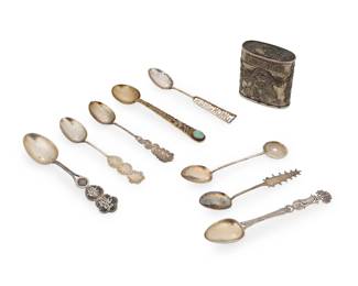 2159 A group of Chinese silver spoons and a silver lidded box 20th century XRF tested: cabochon spoon .970 silver; two spoons .800 silver; the rest about .100 silver; some spuriously impressed: SILVER Comprising eight spoons and one lidded box with dragon motifs, some with vermeil wash 9 pieces Box: 2.5" H x 2.25" W x 1" D; Largest spoon: 5.25" L Estimate: $100 - $200