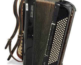 2212 A Settimio Soprani 'Lido' piano accordion Circa 1960s Marked for make and model, and numbered: No 785/19 Made in Italy With 41 keys and 120 bass buttons, housed in a hard case Accordion: 8.5" H x 17" W x 20.5" D; Case: 10.5" H x 20" W x 24" D Estimate: $300 - $500