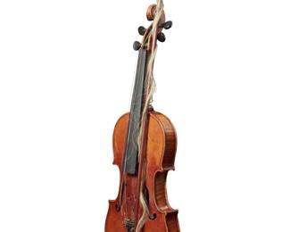 2210 A reproduction Antonius Stradivarius violin and Nurnberger bow 20th century Bow marked: Albert Nurnberger; violin appears unmarked Contained in a hard case Violin: 23.5" H x 8.25" W x 3.25" D; Bow: 29" L; Case: 32" H x 12" W x 5" D Estimate: $300 - $500
