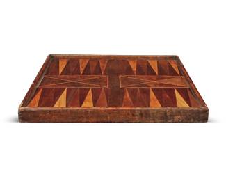 2240 An American parquetry games board Early 19th century With chess/checkers on one side and backgammon on the other 1.5" H x 16.75" W x 16.75" D Estimate: $400 - $600