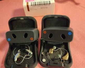 Belong hearing aids with chargers sold separately