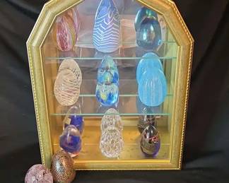 Wall Mounted Display Case Full Of Glass Eggs