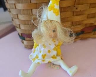 2007 McDonald's Happy Meal toy featuring the Madame Alexander Daisy Munchkin doll