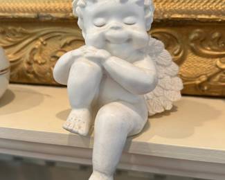 Angel sitting on the edge