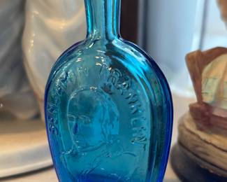 Miniature blue bottle