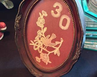 Oval framed art