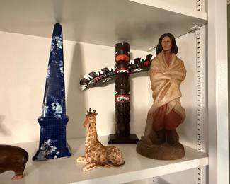 Decorative Shelf Collection: Chinoiserie Obelisk, Totem Pole, Native American Figurine, and Giraffe