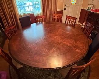Round Pedestal Dining Table with Spool-Trimmed Apron
