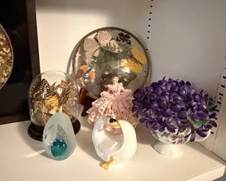 Vintage Decorative Display Domes with Figurines and Floral Arrangement