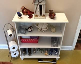 White Bathroom Shelving Unit with Decorative Bird Figurines