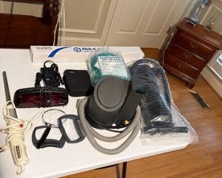 REMstar CPAP machine, Pitch-It IV Pole, oxygen tubing, magnifying glasses, alarm clock
