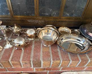 large assortment of vintage silver-plated serving items