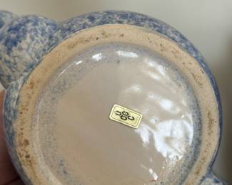 blue and white speckled ceramic teapot