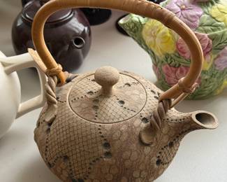snake skin pattern and a bent bamboo handle teapot by artist Don McWhorter