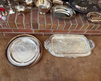 large assortment of vintage silver-plated serving items