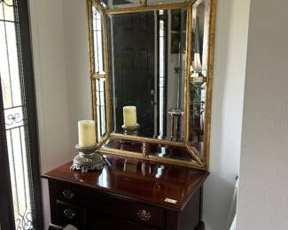 Entry table with elegant vintage mirror