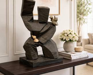 Handcarved abstract wood sculpture with birds and organic natural design.