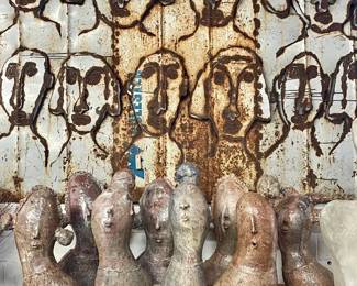 metal wall art and ceramic sculptures
