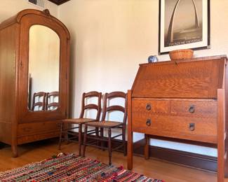 Early Stickley drop down secretary hutch with original tag