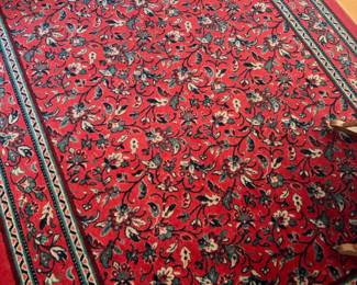 Vintage wool rug with detailed floral pattern