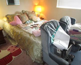 Master bedroom, vintage linens, antique chairs, tons of clothing