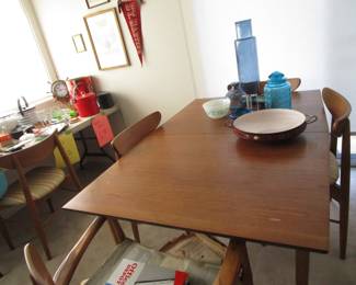 1960 Mid Century Danish Modern Stanley walnut table with 6 chairs and 2 leaves (one Captains)