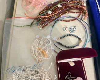 Brand new assortment of coral, freshwater pearls and other precious and semi precious jewelry.