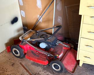 Vintage mower. Other vintage items like drills