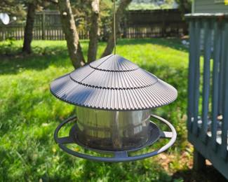 Metal and plastic bird feeder