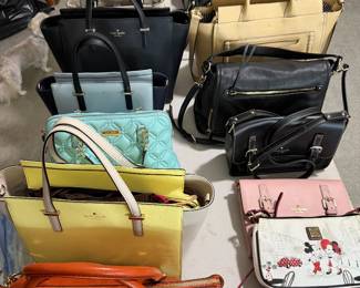 Kate Spade collection with a couple of Michael Kors and Dooney and Burke. Most are in like new perfect condition.