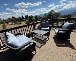 Almost New Outdoor Wicker Patio Furniture Set with Light Blue Cushions and Glass-Top Coffee Table