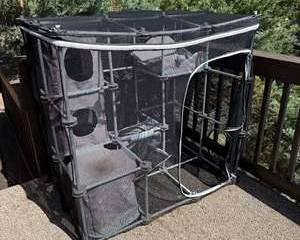 Multi-level Outdoor Cat Enclosure with Mesh Netting and Soft Fabric Cubes