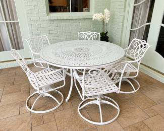 Cast aluminum patio set with glass top