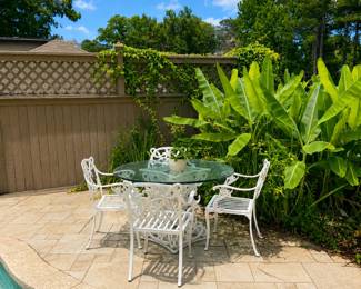 Glass top cast aluminum patio table and chairs