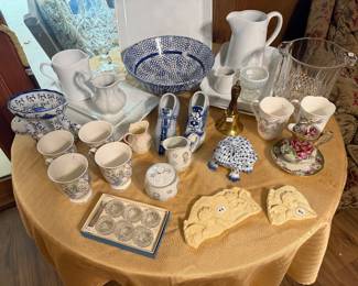 White serving pieces, china tea cups, decor