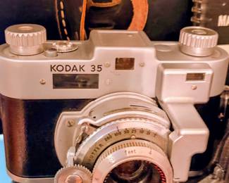 The Kodak 35 was introduced in 1938 as Kodak’s first American-made 35mm camera. It features a Bakelite body, two film advance knobs, and various Kodak Anastigmat lenses
