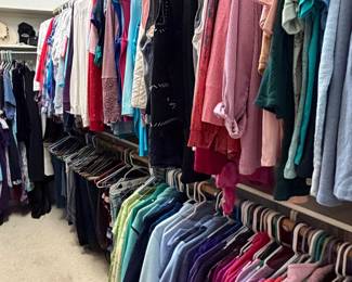 Packed closet with designer women's clothing!