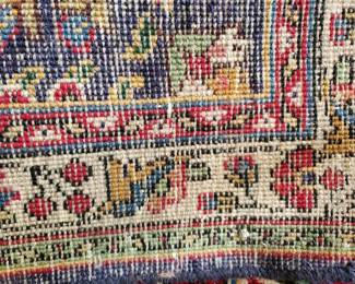 A look at the bottom of the handmade wool rug