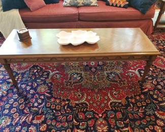 This mid-century coffee table by Drexel matches the two end tables.