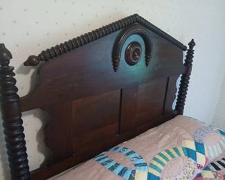 Antique rope bed with feather mattress